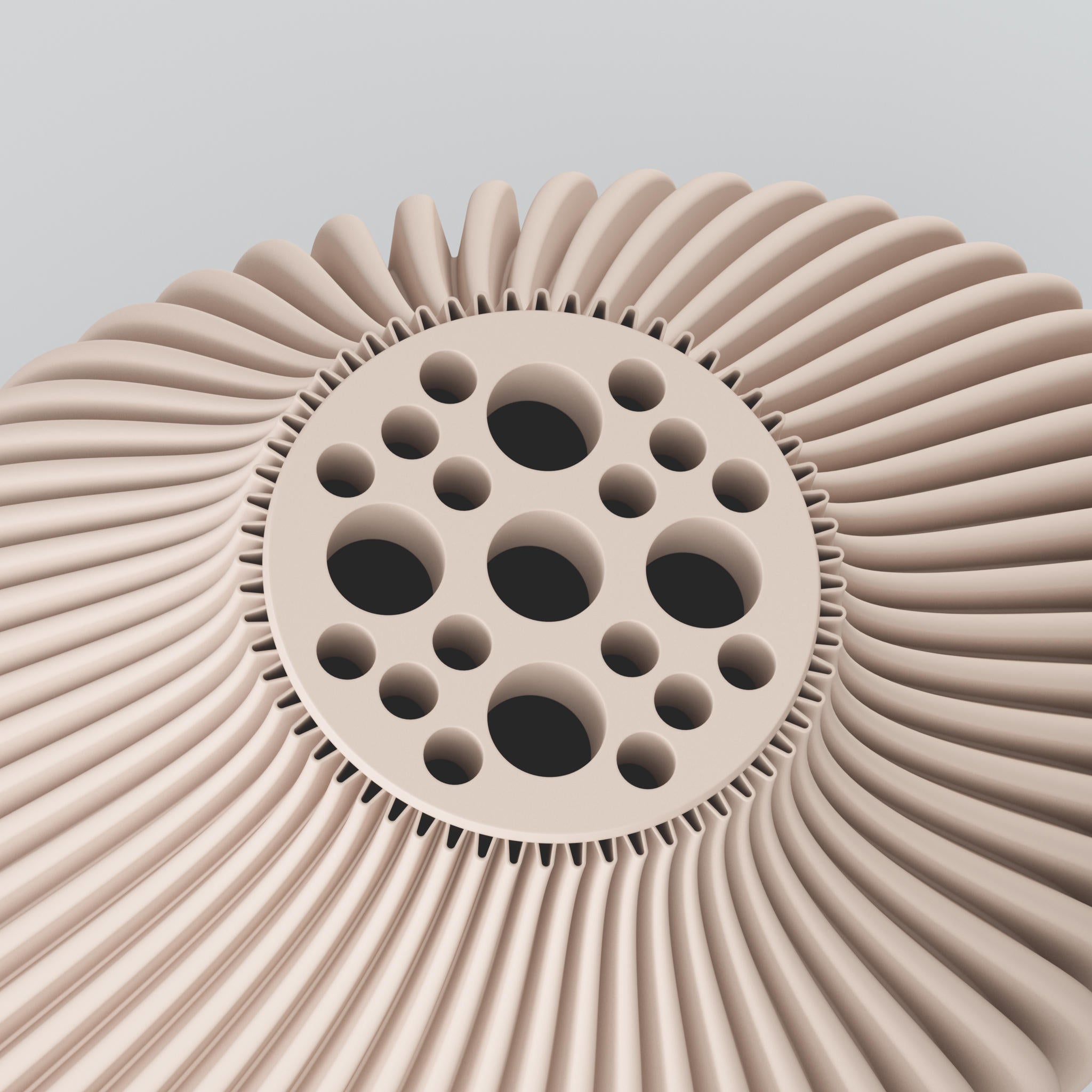 Zahnradähnliches 3D-Element mit runder Scheibe und vielen Lochöffnungen, umgeben von radialen Rippen auf hellem Hintergrund