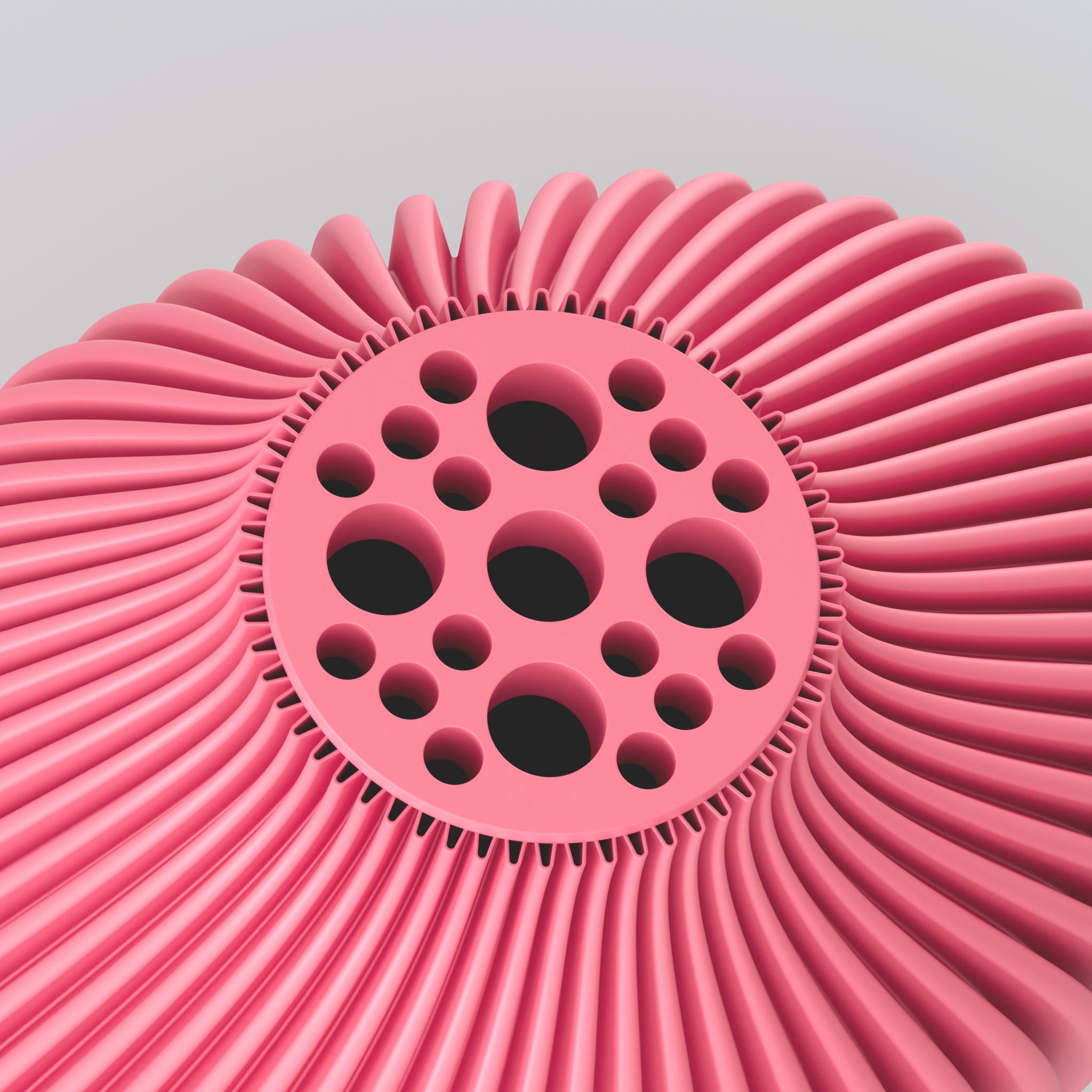 Rosa zahnradartiges 3D-Objekt mit kreisförmiger Platte voller Öffnungen und radialen Rippen vor grauem Hintergrund